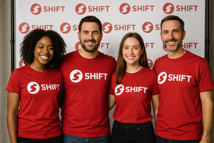 Marketing team in custom t-shirts with brand logo at launch event